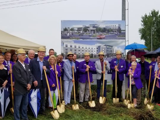 Group gathered for the Holiday Inn groundbreaking in Cedar Falls, IA