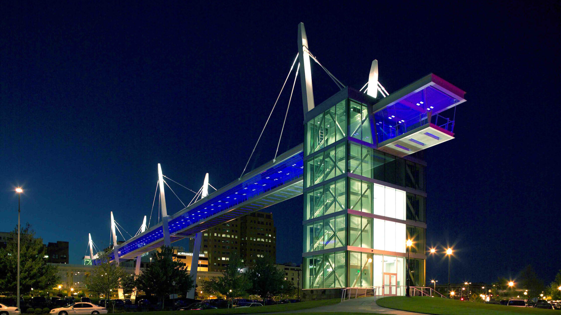 View of Davenport Skybridge at night as seen from ground level.