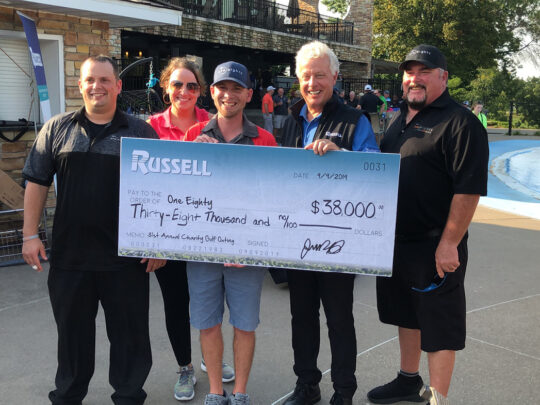 Presenting the check to One Eighty