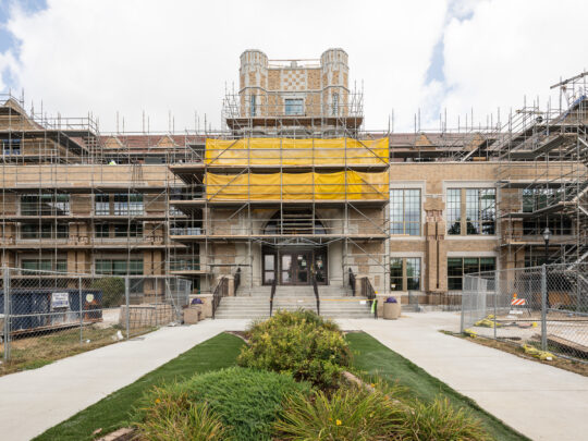 Front entrance of Dixon High School with scaffolding