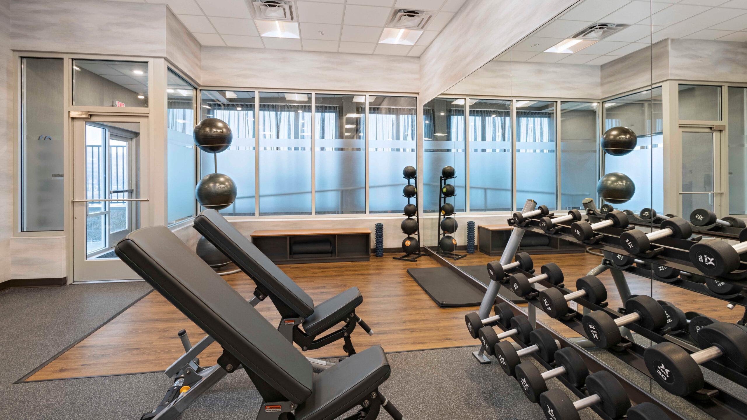 hotel gym with hand weights rack