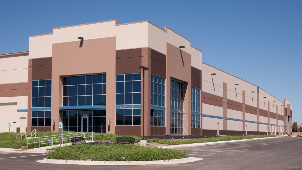 warehouse with large windows and landscaping