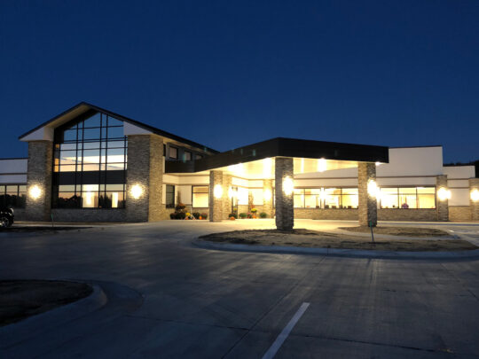 Exterior shot at night of medical facility