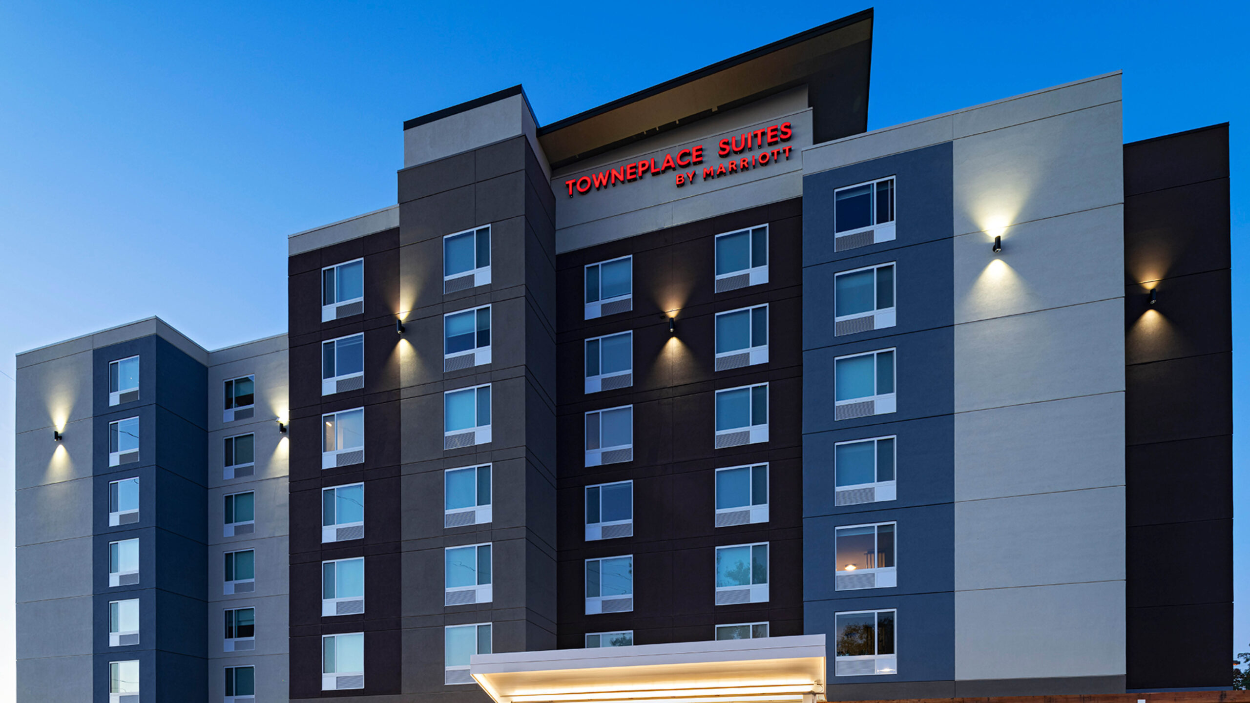 multi-story hotel exterior with numerous windows