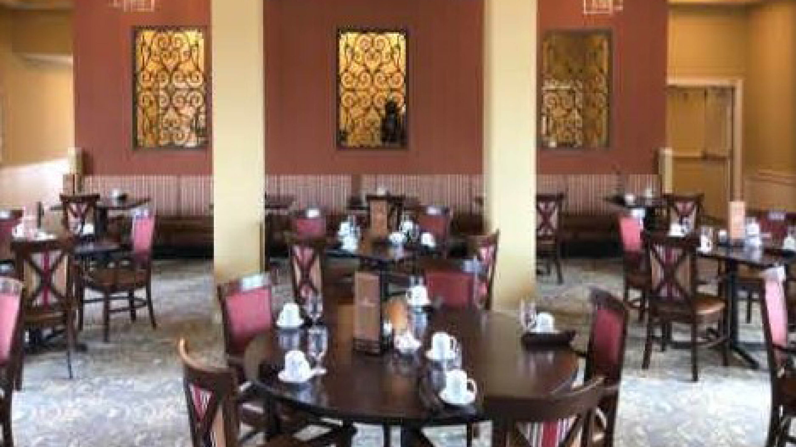 dining area with multiple tables and chairs