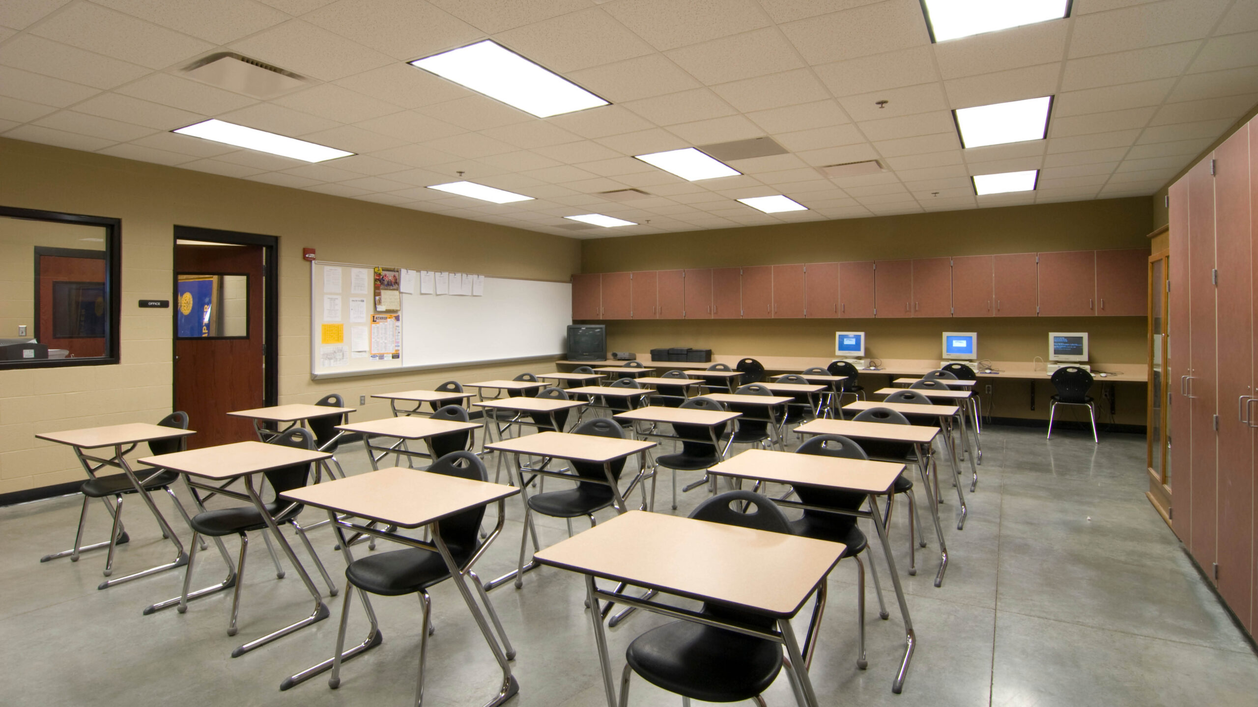 classroom with individual desks and chairs