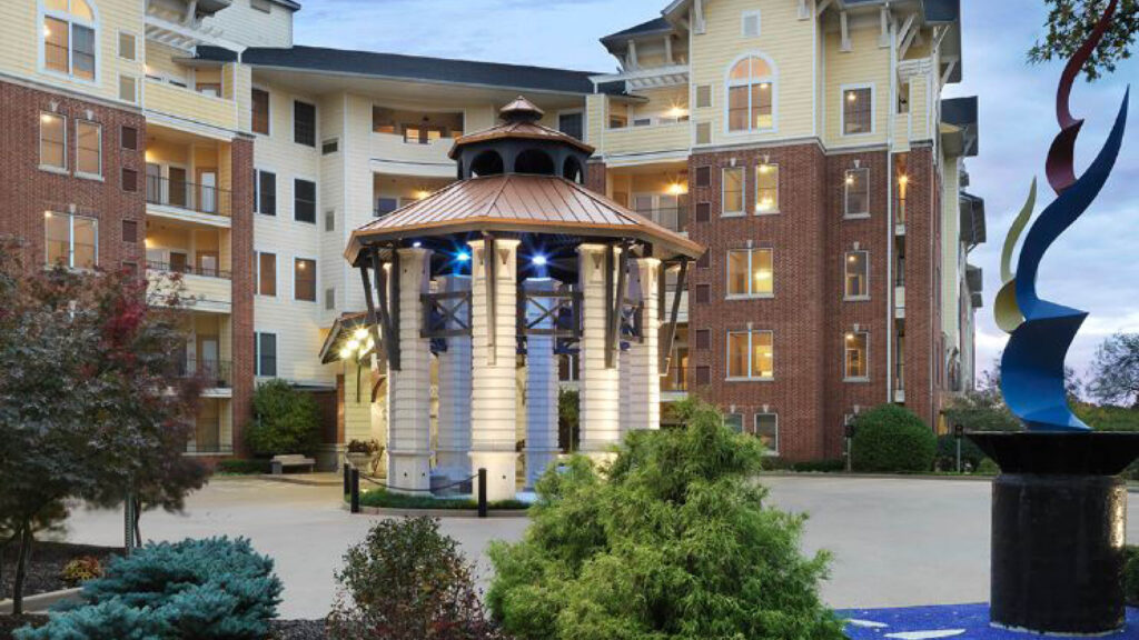 exterior view of an apartment building with a gazebo