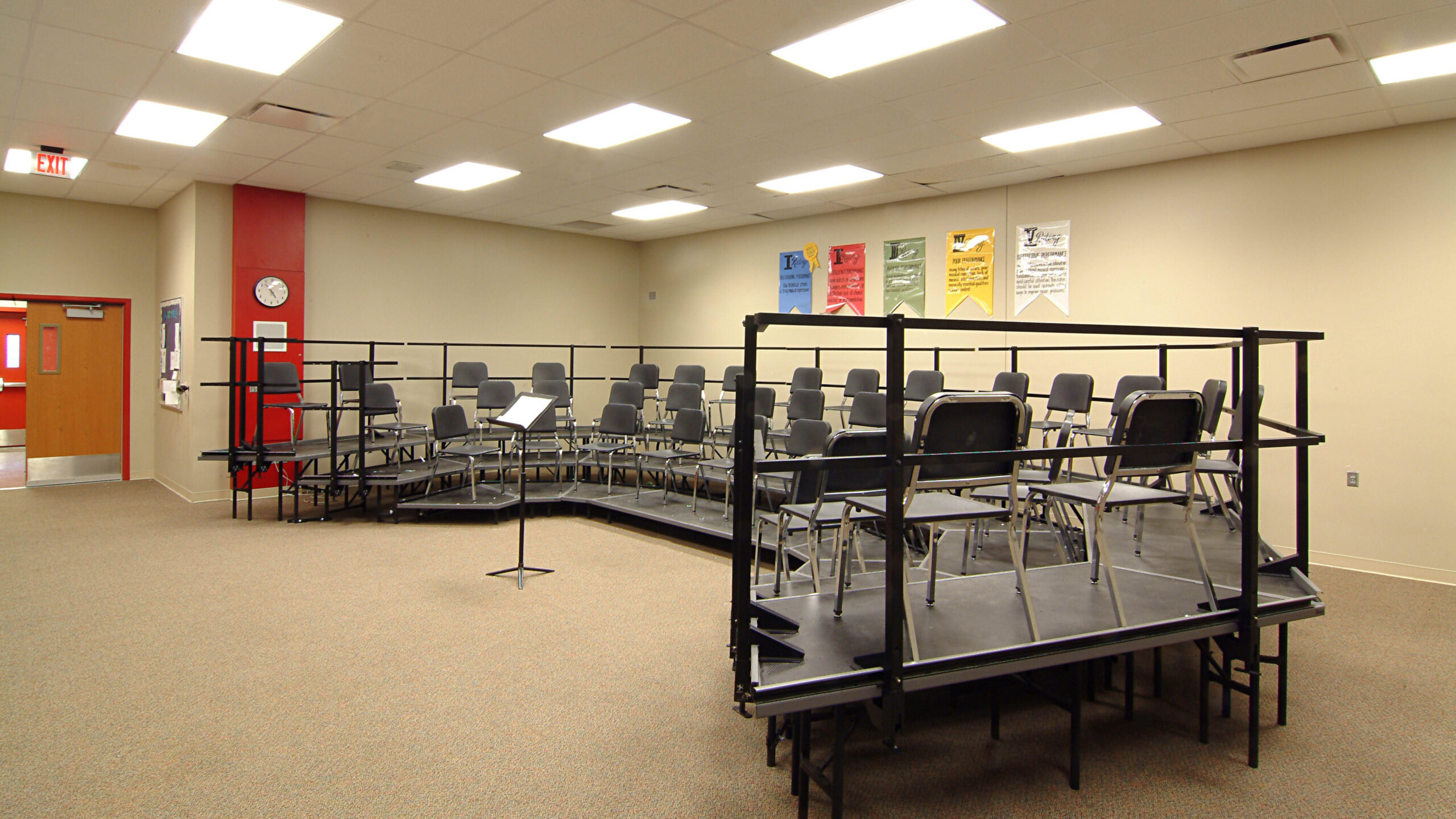 choir room with risers and chairs