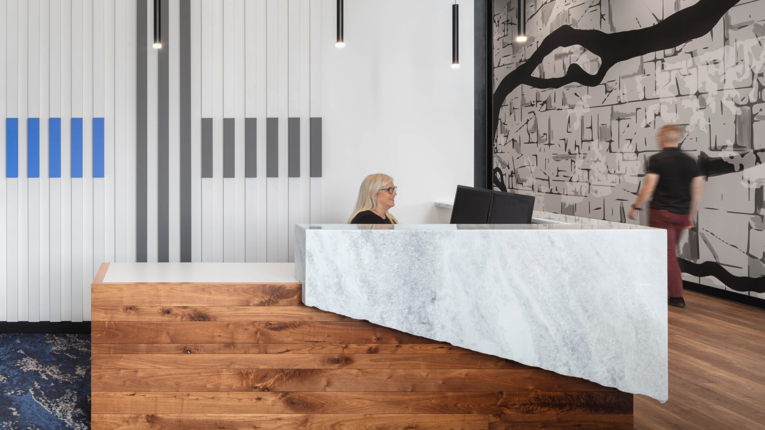 woman working at a reception desk
