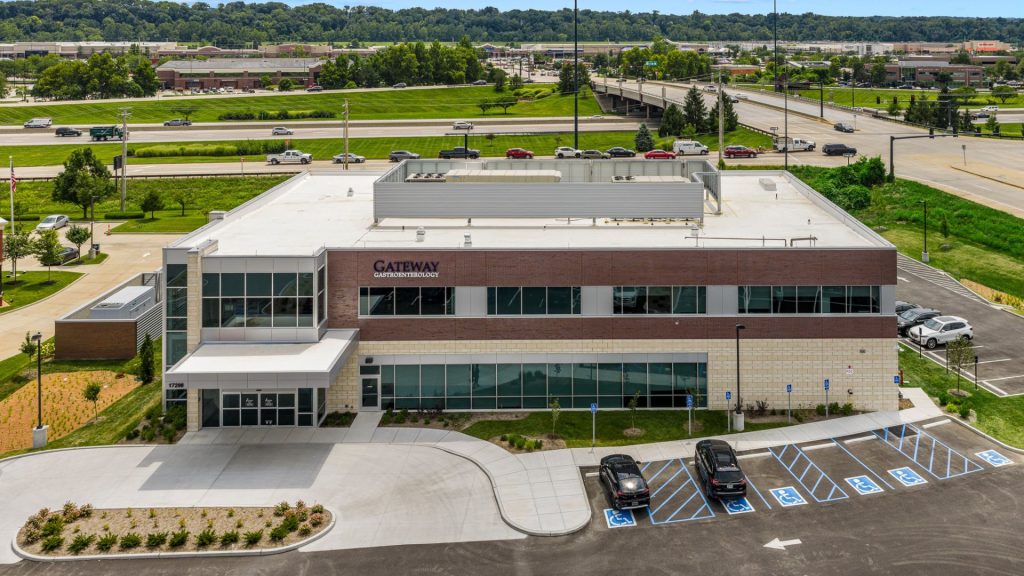 Aerial view of Gateway Gastroenterology medical building in Chesterfield, MO with brick and stone facade and parking lot