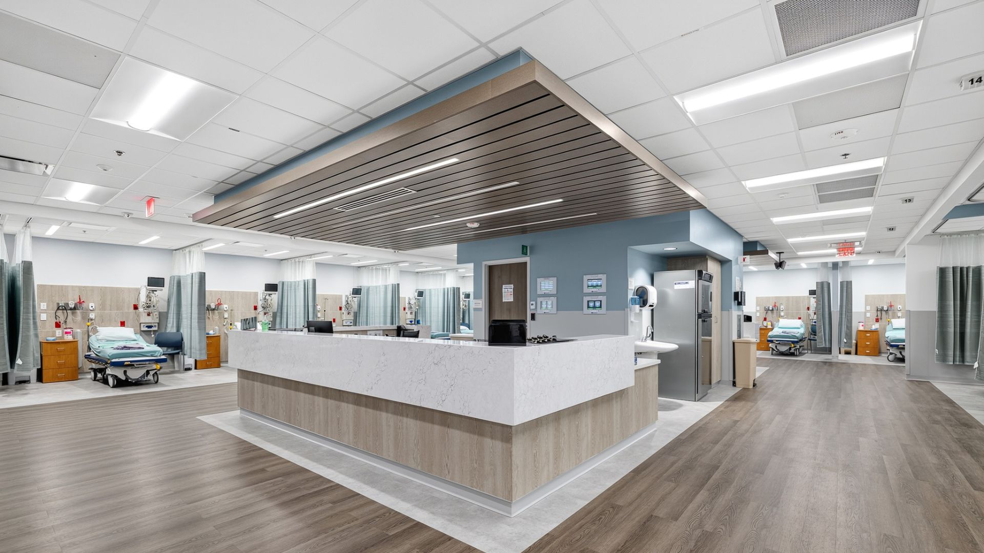 Ambulatory surgery center recovery area at Gateway Gastroenterology with nurse station and patient bays